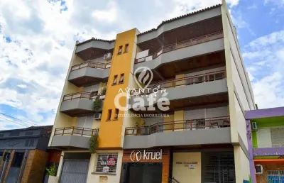 Apartamento com 3 dormitórios, sala, cozinha, terraço e 2 vagas de garagem.