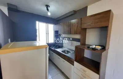 Apartamento de 2 dormitórios com vaga de estacionamento.