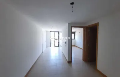Apartamento novo de 1 dormitório, sala e cozinha integrados, sacada com churrasq