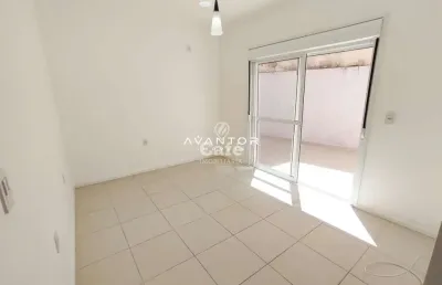 Apartamento amplo com 1 dormitório, churrasqueira, amplo terraço e 2 garagens. b