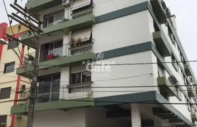 Apartamento amplo de 1 dormitório, 2 banheiros, garagem, centro edifício málaga