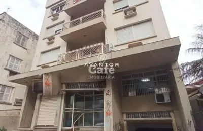 Apartamento no centro de 2 dormitórios, sala de estar, banheiro social, cozinha,