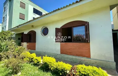 Casa no bairro medianeira de 3 dormitórios, suíte, (2) salas, lareira, (2) banhe