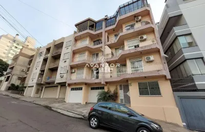 Duplex ,  4 dormitórios, 2 banheiros,  churrasqueira, box garagem, centro