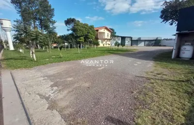Terreno amplo de 3.800 m² com casa, pavilhão e galpão, para alugar na br 158.