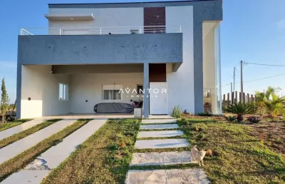Casa nova no condomínio alexandria, com 5 dormitórios, 4 suítes, garagem p/ 2 ca