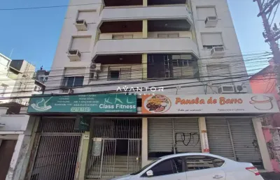 Apartamento amplo no centro de 1 dormitório, sala 2 ambientes, banheiro social,