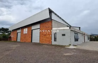 Pavilhão amplo de 1000 m², mais banheiro e estacionamento. na br 287.