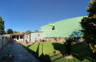 Casa de 3 dormitórios, sala de estar, banheiro social, cozinha, área de serviço,