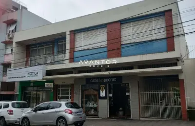Duas salas comerciais e apartamento amplo para venda na região central