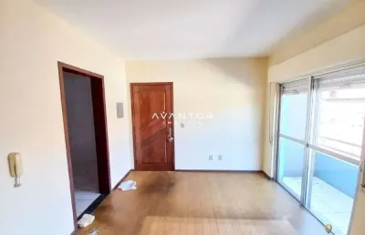 Apartamento de 2 dormitórios, sala de estar com sacada, banheiro social, cozinha
