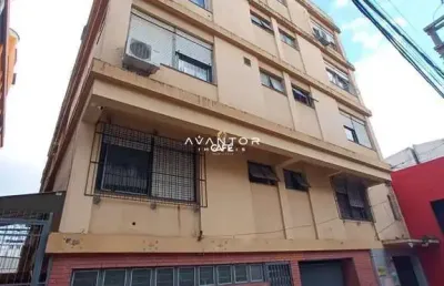 Apartamento central de 1 dormitório, sala de estar, banheiro social, cozinha e á