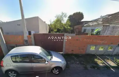 Terreno de 380 m², próximo a escolas e supermercados.