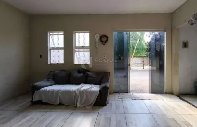 Casa ampla com 4 dormitórios (1 suíte) + edícula em terreno de 365m²