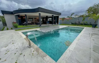 Casa alto padrão com 4 suítes, 8 vagas de garagem, bairro bandeirantes (pampulha)- belo horizonte