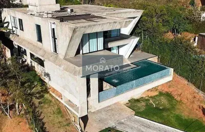 Casa com 4 quartos sendo 4 suítes e 6 vagas no condomínio mirante da mata em nova lima.
