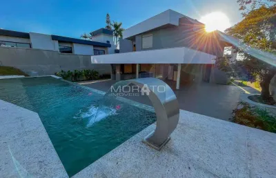 Casa com 4 suítes e 6 vagas de garagem no bairro bandeirantes (pampulha)