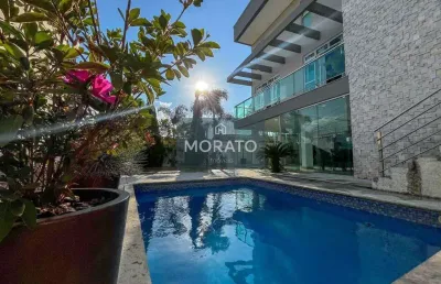 Casa com 4 quartos sendo 1 suíte e 4 vagas, no bairro europa em contagem.