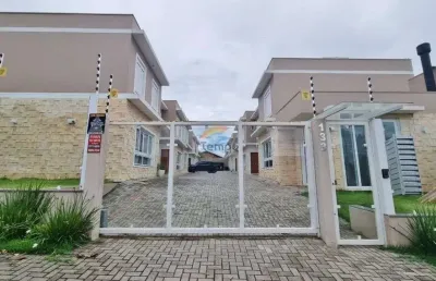 Sobrado novo em condomínio estilo contemporâneo, 03 dormitórios, sendo 01 suíte, 02 vagas de garagem.