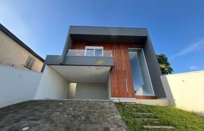 Belíssima casa contemporânea, possui 243m² de área construída, sendo 03 suítes,  bairro jardim mauá, novo hamburgo-rs.