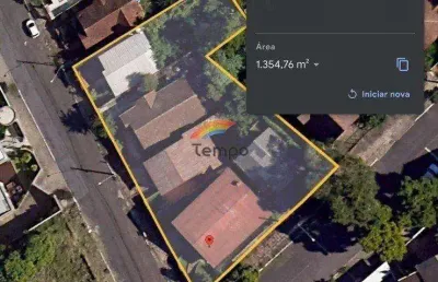 Área com 3 casas, localizado no bairro operário de novo hamburgo/rs