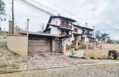 Casa com 5 dormitórios sendo 1 suíte, localizado no bairro vila nova de novo hamburgo/rs