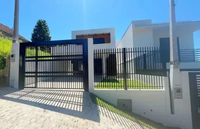 Sobrado novo com 182m² construídos, projeto moderno e lindo!