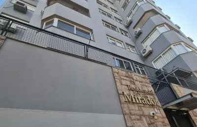 Excelente vista panorâmica, apartamento 2 dormitórios, 2 vagas, churrasqueira e semimobiliado