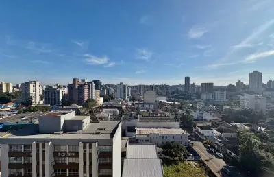 Apartamento andar alto no centro - 2 dormitórios, churrasqueira, vaga de garagem, infra