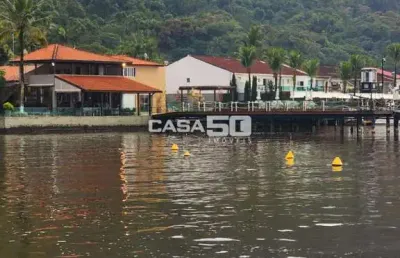 Casa em condomínio fechado com 2 quartos à venda na rod. ariovaldo de almeida de viana, 3969, balneario praia do perequê, guarujá, 90 m2 por r$ 750.000
