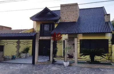 Casa com 3 quartos à venda na rua joão nicolau, 109, fátima, canoas por r$ 1.490.000