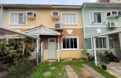 Casa em condomínio fechado com 3 quartos à venda na avenida santos ferreira, 1180, marechal rondon, canoas por r$ 399.000