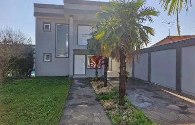 Casa com 3 quartos para alugar na josé veríssimo, 1190, harmonia, canoas por r$ 4.900