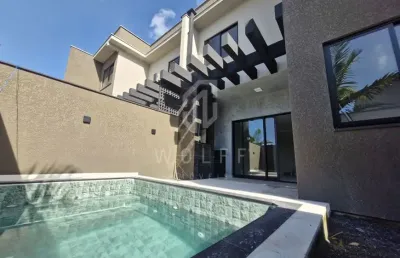 Sobrado com piscina e acabamento impecável, 160 m² de área privativa, itajubá - barra velha - sc