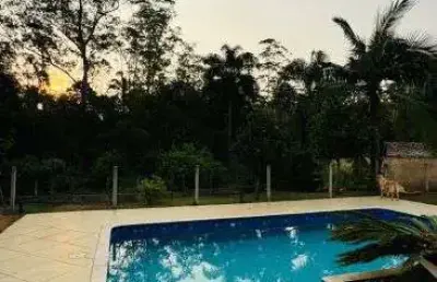 Encante-se com esta magnífica casa térrea no exclusivo condomínio fazenda da ilha