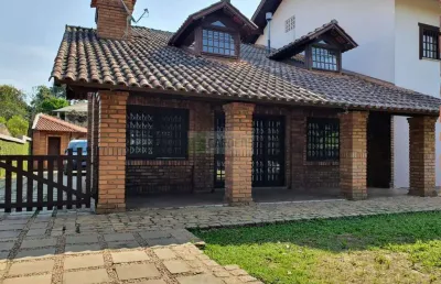 Residência em estilo rústico em terreno de  1.216, m² bairro industrial, nh