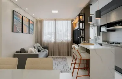Apartamento mobiliado com projeto arquitetônico e infraestrutura completa – 2 dorms, 2 vagas, próximo à sogipa!