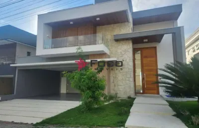 Casa com 4 suítes, 450m² por r$ 3.150.000,00 - condomínio residencial jaguary