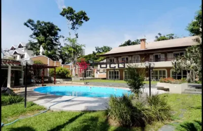 Casa com 4 suítes á venda no condomínio quinta das flores