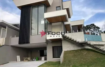 Casa com 4 dormitórios á venda, 477 m2 por r$ 3.600.000,00 - condomínio residencial jaguary -