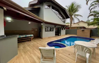 Casa com piscina e 4 suítes - condomínio costa do sol - praia de guaratuba/sp