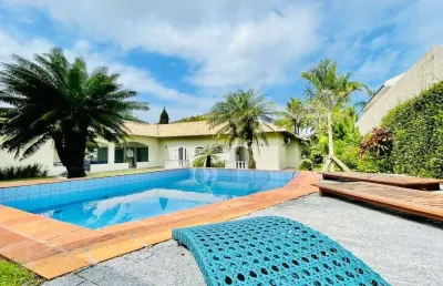 Casa em condomínio fechado com 5 quartos à venda no Jardim Acapulco, Guarujá 