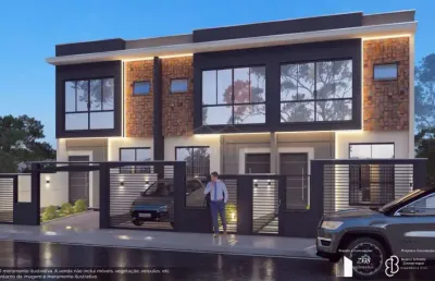 Sobrado geminado de alto padrão com 02 suítes à venda, r$ 600.000,00 bairro gravatá em navegantes