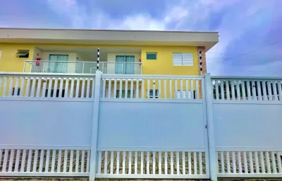 Vende se village com 2 dormitórios sendo 1 suite a 1 quadra da praia , 2 min a pé
