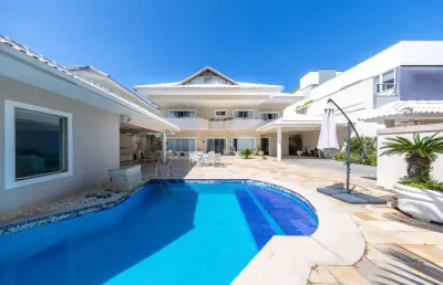 Residencial triplex de alto padrão no condomínio quintas do rio - barra da tijuca