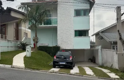 Lindo sobrado com piscina ótima localização no condominjo arujá 5
