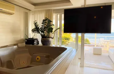 Casa no condomínio island view, pé na areia, com 5 suítes em juquehy - locação diária