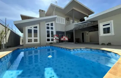 Casa de alto padrão com localização privilegiada no condomínio sunset park