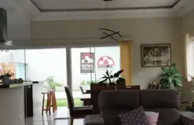 Casa com 4 quartos à venda na Rua Ademar Martins, 335, Jardim Britânia, Caraguatatuba