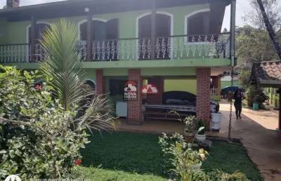 Casa com 5 quartos à venda na Rua Doutor Carlos Adalberto Garcia, 220, Martim de Sá, Caraguatatuba